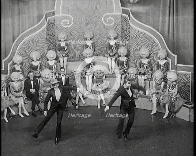 Male and Female Actors in Costumes Performing a Dance Routine On Stage, 1920s. Creator: British Pathe Ltd.