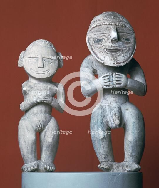 Male and female ancestor figures from Melanesia. Artist: Unknown