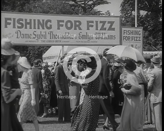 Male and Female Patrons at  a Theatrical Garden Party at  the Ranelagh Club, Barnes..., 1939. Creator: British Pathe Ltd.