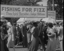 Male and Female Patrons at a Theatrical Garden Party at the Ranelagh Club, Barnes..., 1939. Creator: British Pathe Ltd