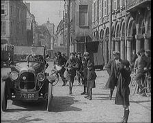Male British Civilian Driving a Car Executing a Turning Manoeuvre On the Streets of London..., 1920s Creator: British Pathe Ltd