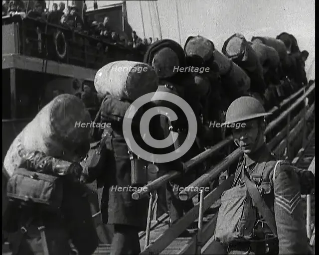 Male British Expeditionary Force Solders With Their Packs Walking up a Gangplank Past..., 1939. Creator: British Pathe Ltd.