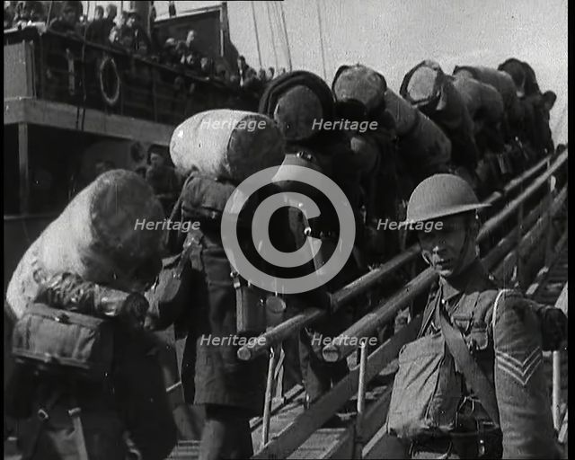 Male British Expeditionary Force Solders With Their Packs Walking up a Gangplank Past..., 1939. Creator: British Pathe Ltd.
