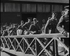 Male British Expeditionary Force Soldiers Walking up the Gangplank of a Ship in a British..., 1939. Creator: British Pathe Ltd