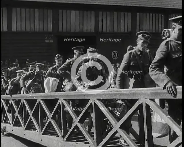 Male British Expeditionary Force Soldiers Walking up the Gangplank of a Ship in a British..., 1939. Creator: British Pathe Ltd.