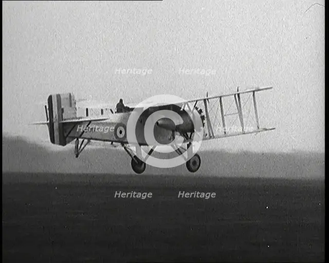 Male British Pilot Taking Off On a Large Plane, 1920s. Creator: British Pathe Ltd.