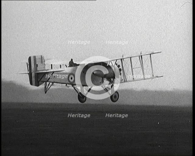 Male British Pilot Taking Off On a Large Plane, 1920s. Creator: British Pathe Ltd.