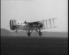 Male British Pilot Taking Off On a Large Plane, 1920s. Creator: British Pathe Ltd
