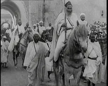 Male Cavalry Soldiers Entering a Town, 1920s. Creator: British Pathe Ltd