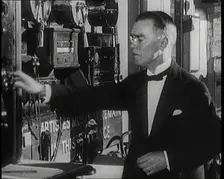 Male Civilian Working Theatrical Equipment Back Stage at a Theatre, 1920s. Creator: British Pathe Ltd