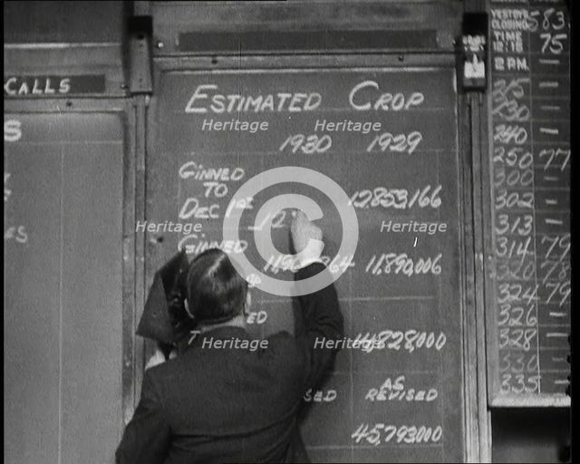 Male Civilian Writing the Newest Stock Prices On a Blackboard, 1932. Creator: British Pathe Ltd.