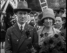 Male Civilian (Groom) And Female Civilian (Bride) Emerging from a Church To Walk Through an...,1927 Creator: British Pathe Ltd