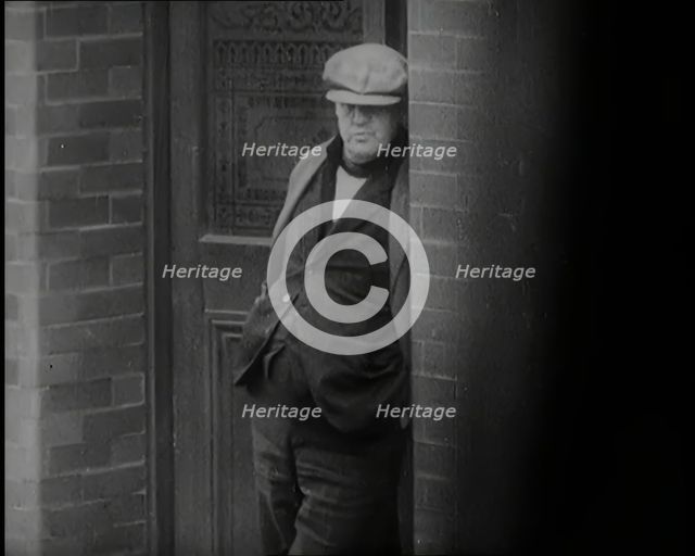 Male Civilians Standing in the Streets, 1926. Creator: British Pathe Ltd.