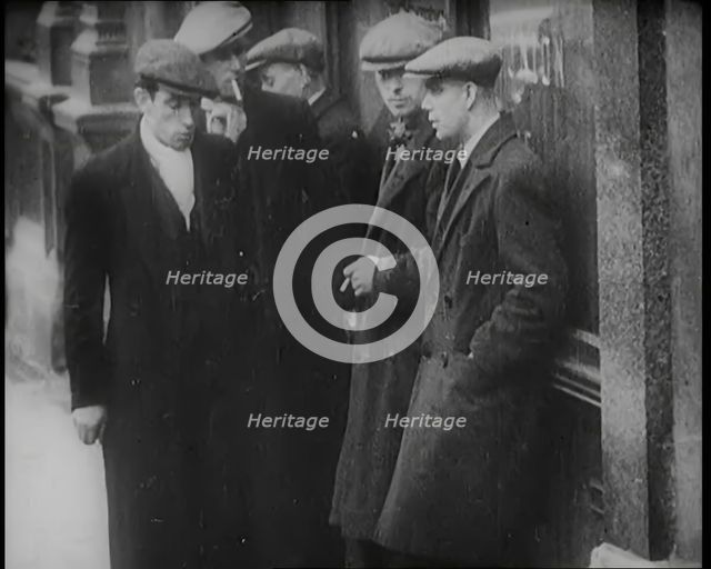 Male Civilians Standing in the Streets, 1926. Creator: British Pathe Ltd.