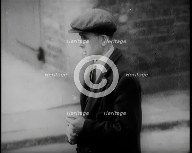 Male Civilians Standing in the Streets, 1926. Creator: British Pathe Ltd.