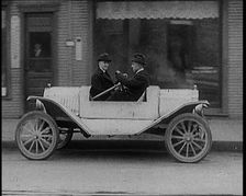 Male Civilians Test Driving the Two Way Car Which Has Two Steering Wheels and Can Be Driven..., 1929 Creator: British Pathe Ltd