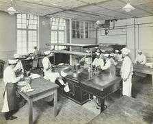 Male cookery students at work in the kitchen, Westminster Technical Institute, London, 1910