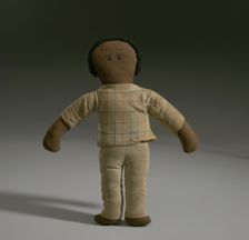 Male doll with tan clothing, ca.1965. Creator: Unknown