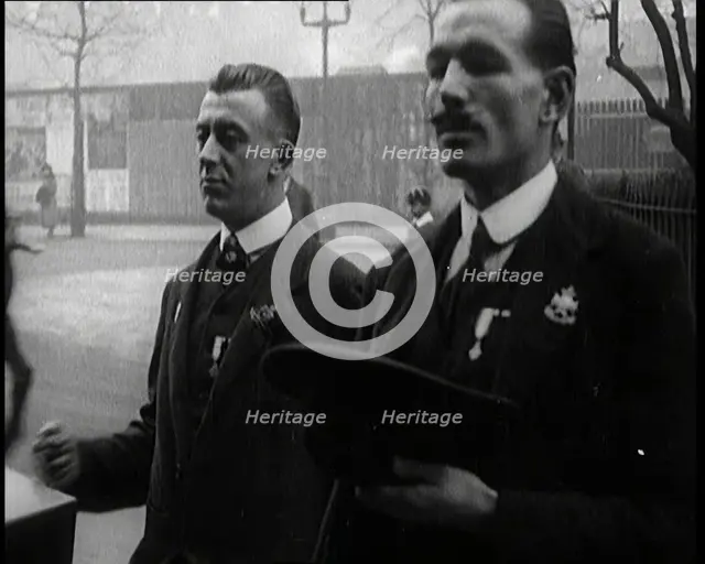 Male Ex-Services Civilians Playing a Hurdy-Gurdy For Money in the Street, 1920s. Creator: British Pathe Ltd.