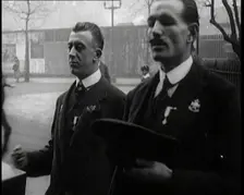 Male Ex-Services Civilians Playing a Hurdy-Gurdy For Money in the Street, 1920s. Creator: British Pathe Ltd