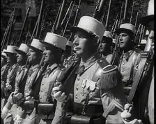 Male French Foreign Legion Soldiers Marching in a Bastille Day Military Parade, 1939. Creator: British Pathe Ltd