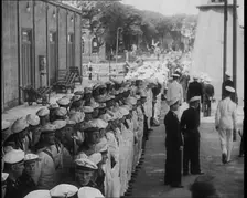 Male German Navy Crew Lined up in Front of a Building in Montevideo, 1939. Creator: British Pathe Ltd