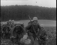 Male German Soldiers On Manoeuvres, 1920s. Creator: British Pathe Ltd