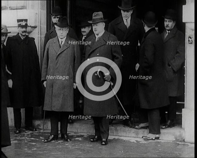 Male Ministers Standing on the Steps of a Large Building Having Been Admitted Into the,,,, 1926. Creator: British Pathe Ltd.