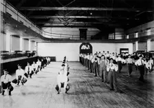 Male Native American students in physical education class, Carlisle..., Pennsylvania, c1901 - 1903. Creator: Frances Benjamin Johnston