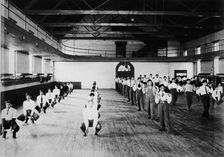 Male Native American students in physical education class, Carlisle..., Pennsylvania, c1901 - 1903. Creator: Frances Benjamin Johnston