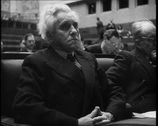 Male Representative of the League of Nations Listening to Speeches, 1937. Creator: British Pathe Ltd