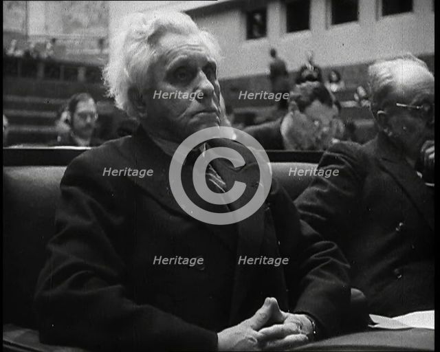 Male Representative of the League of Nations Listening to Speeches, 1937. Creator: British Pathe Ltd.