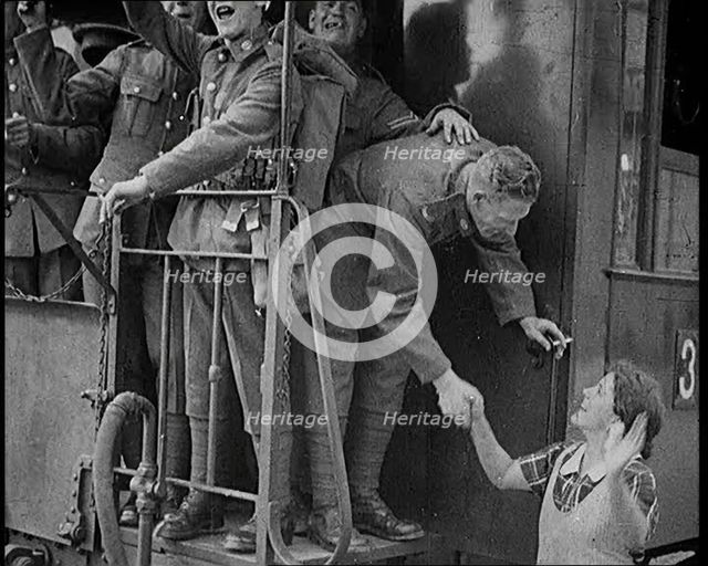 Male Soldier Shaking Hands with Female Civilian, 1929. Creator: British Pathe Ltd.