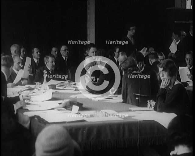 Male Swiss Civilians and Female Swiss Civilians at a Meeting of the League of Nations in..., 1920s. Creator: British Pathe Ltd.