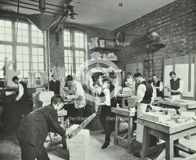 Male students at work in the Mason's Shop, Northern Polytechnic, London, 1911.  Artist: Unknown.