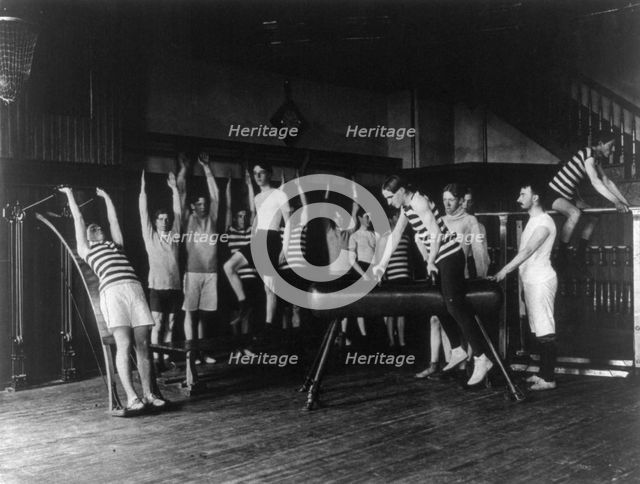 Male students exercising, some with equipment, Western High School, Washington, D.C., (1899?). Creator: Frances Benjamin Johnston.