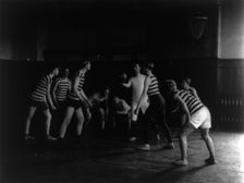 Male students playing basketball, Western High School, Washington, D.C., (1899?). Creator: Frances Benjamin Johnston