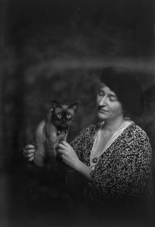 Malvina Hoffman with cat, portrait photograph, 1933 June 27. Creator: Arnold Genthe