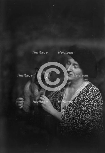 Malvina Hoffman with cat, portrait photograph, 1933 June 27. Creator: Arnold Genthe.