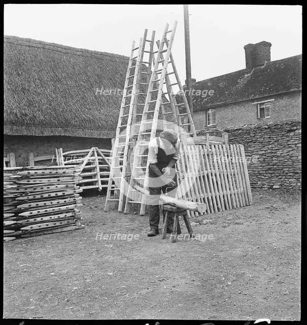 Man making a willow ladder in the village of Aston, Cote, Shifford and Chimney, Oxfordshire, 1930-50 Creator: George R Long.