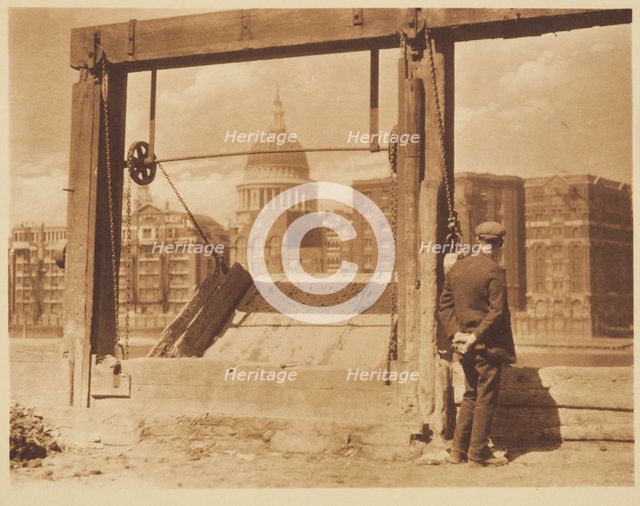 [Man on riverbank]. From the album: Photograph album - London, 1920s. Creator: Harry Moult.