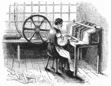 Man operating machine punching cards for Jacquard looms, 1844