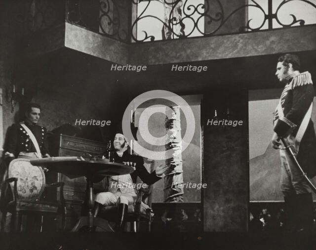 Man at table with bottle, 1938. Creator: Unknown.
