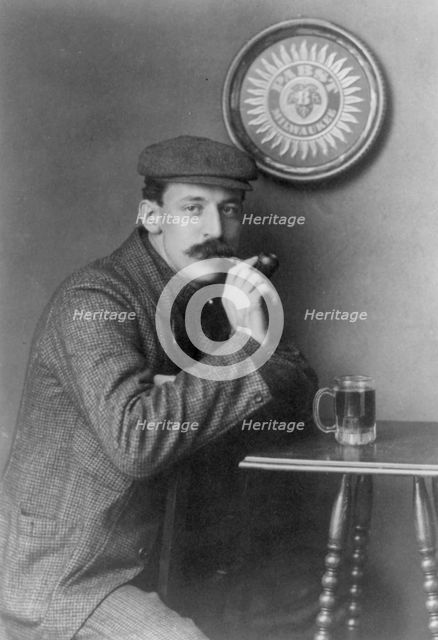 Man at table with pipe and mug under "Pabst - Milwaukee" sign - C.C. Jones, between c1890 and c1910. Creator: Frances Benjamin Johnston.