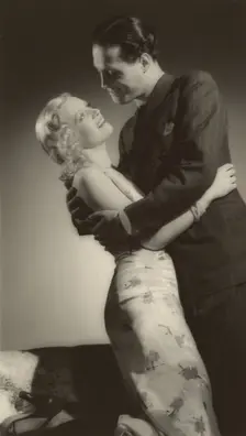 Man and woman embracing, about 1931-1940. Creator: Gunther Krampf