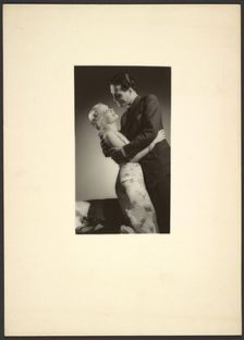 Man and woman embracing, about 1931-1940. Creator: Gunther Krampf
