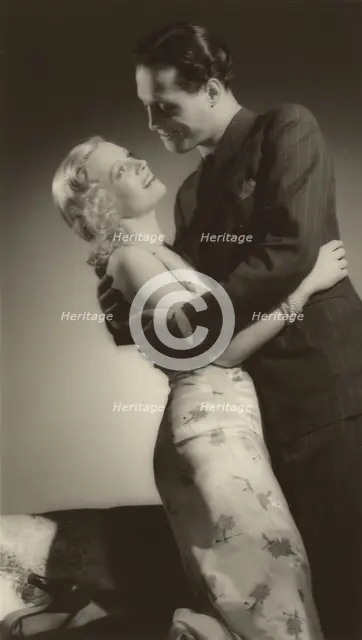 Man and woman embracing, about 1931-1940. Creator: Gunther Krampf.