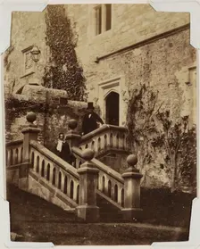 Man and Woman Standing on Exterior Stairs, c1870. Creator: Francis Edmund Currey