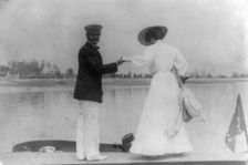 Man assisting woman into boat, Oyster Bay, Long Island, N.Y., 1905. Creator: Frances Benjamin Johnston