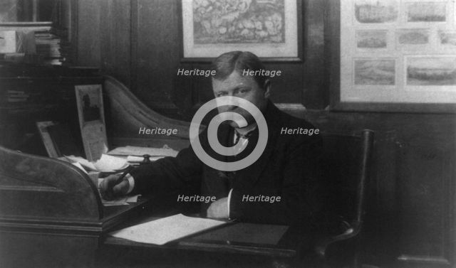 Man (banker?) seated at desk in American Security and Trust Co., Washington, D.C., c1890 - c1950. Creator: Frances Benjamin Johnston.